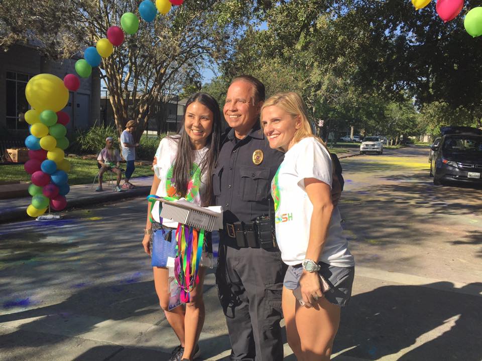 Police officer with 2 event planners